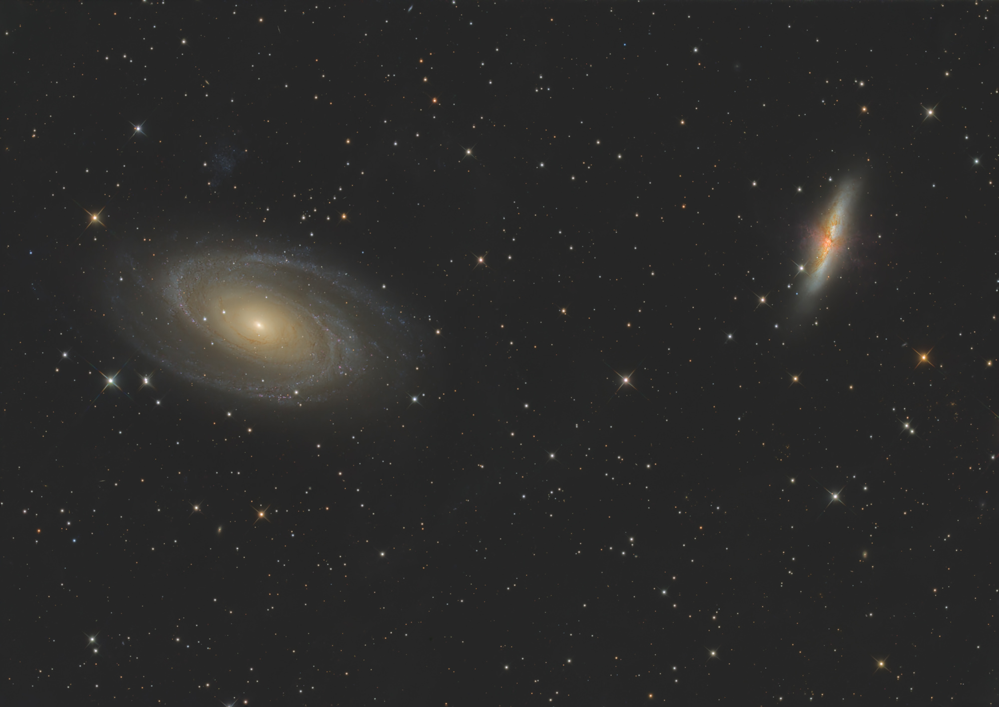 Messier 81 or Bode's Galaxy and the right galaxy Messier 82 or Cigar Galaxy and lie in the constellation Ursa Major.